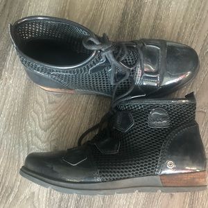 Rarely worn women’s Sorel Boots. Leather with perforated 3/4 top with ties.